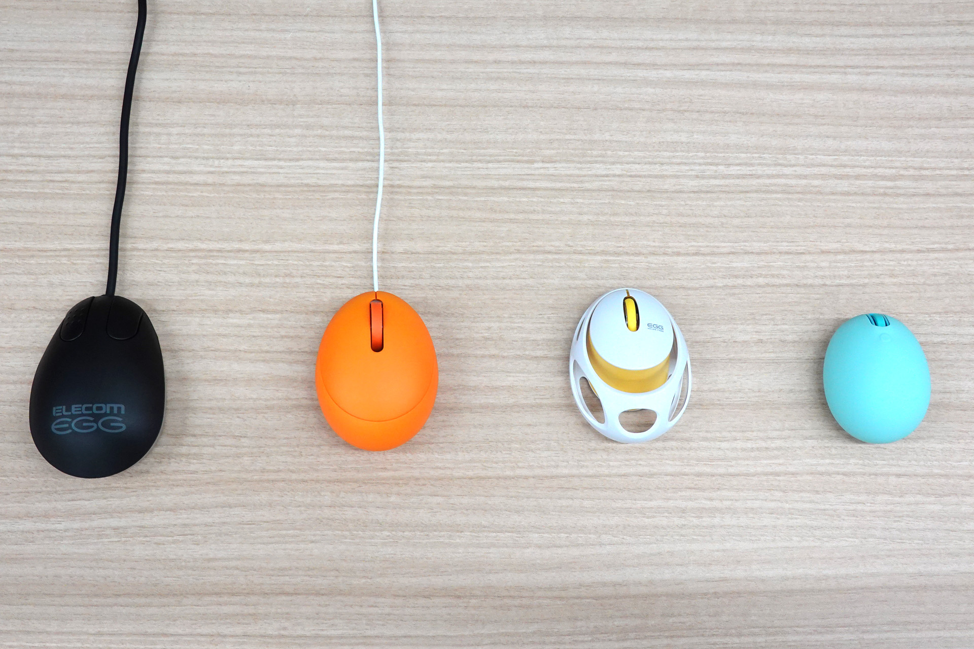 左から初代「EGG MOUSE」、「OPTICAL EGG MOUSE」、「EGG MOUSE FREE」、新「EGG MOUSE」