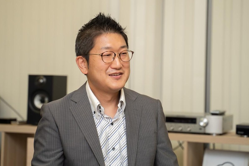 デノンブランドを担当する田中清崇氏