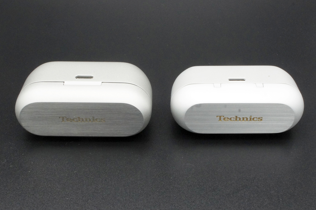 横倒しにしたところ。左がAZ80、右がAZ100。薄型になっているだけでなく、上部周辺の丸みを大きくして持ちやすい形状としている。また、上面のアルミパネルもヘアライン処理やロゴの印字色を変更し、より質感を高めている