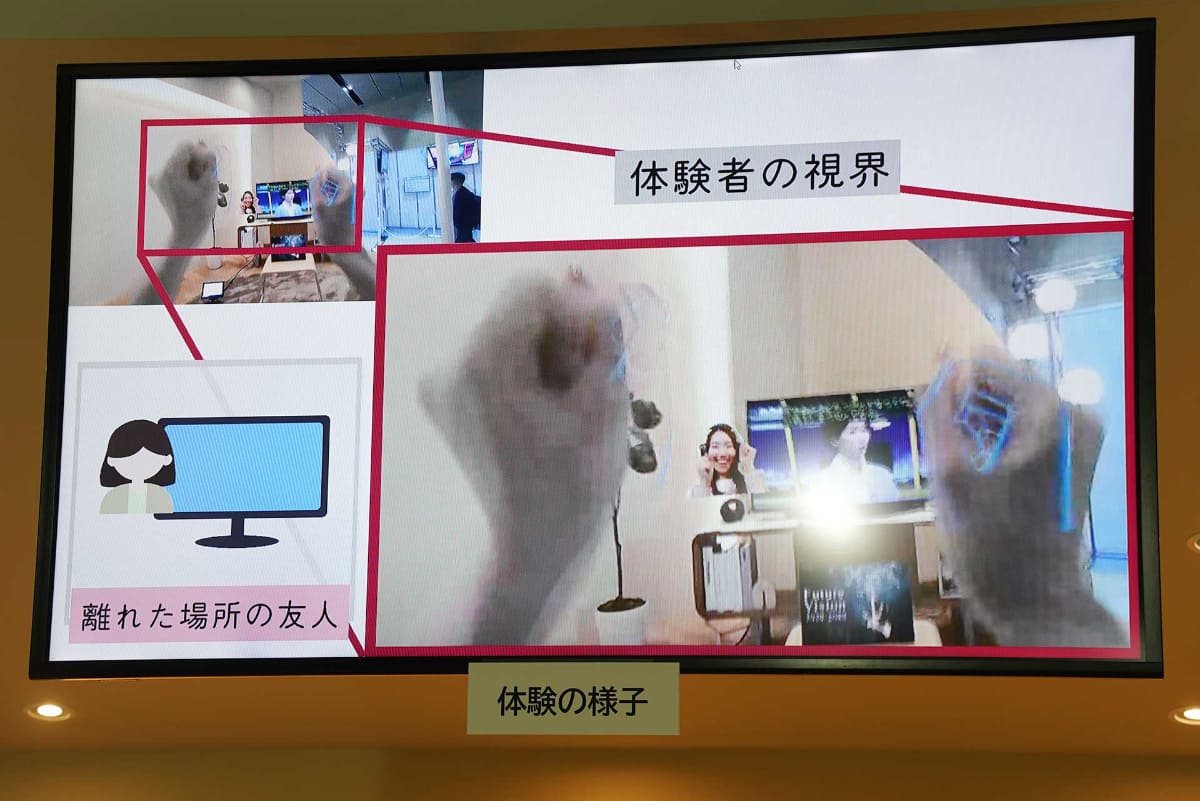 ARグラス装着者の視界には、離れた場所の友人の映像が表示されるほか、指先の操作で動画の早送り/巻き戻し、拍手といったリアクションの共有などができる