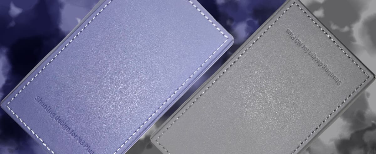 専用UPレザーケース パープル(左)、グレー(右)