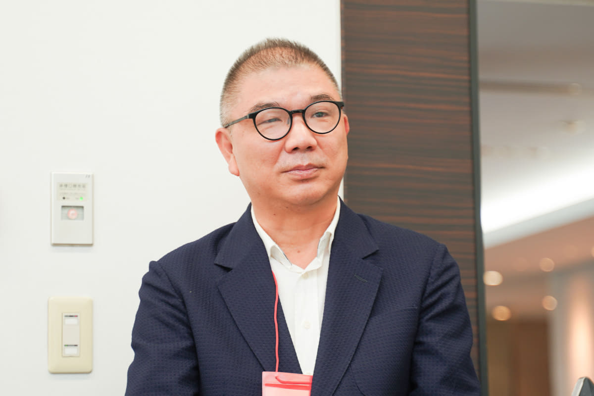 CAIAの執行副会長兼ヘッドフォン分科会会長のチン・リッシン氏