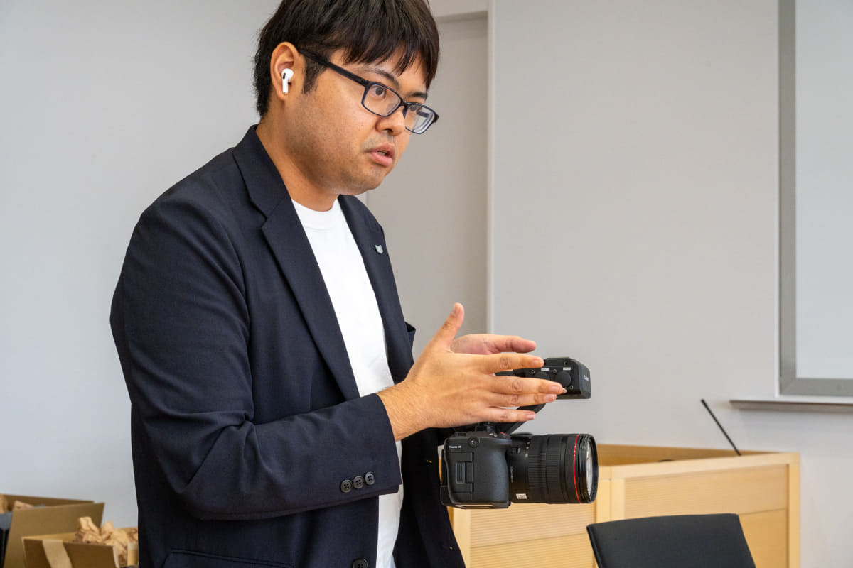 榊田氏