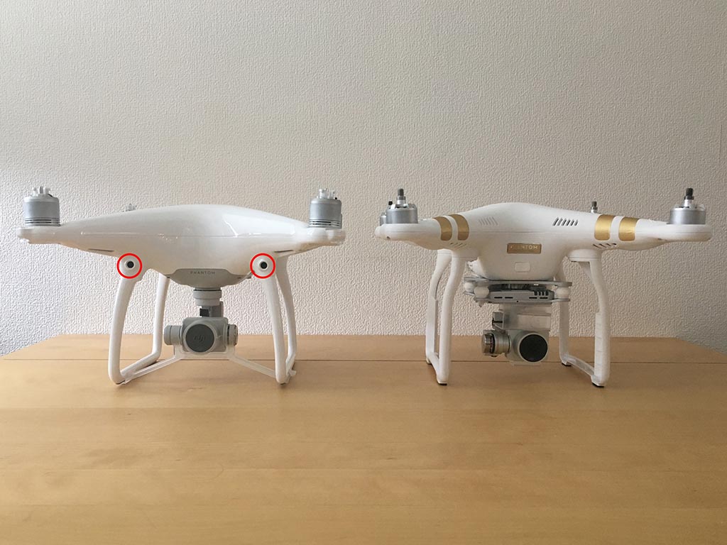 左がPhantom 4、右がPhantom 3Professional。見比べると、本体の形状と、カメラを支えるジンバルが変わっていることが分かる。赤丸で囲った部分が光学センサーで、Phantom 4は前面に2個搭載している