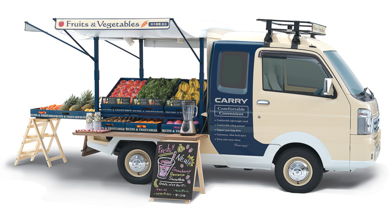 荷台には商品の展示や陳列が簡単かつきれいにできるボックスや引き出しを採用。上下に可動する荷台カバーには太陽電池や日よけタープを内蔵した