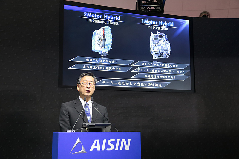 2モーターハイブリッドトランスミッションと1モーターハイブリッドトランスミッションとの比較、FF1モーターハイブリッドトランスミッションやeAxle、車両統合制御についての説明
