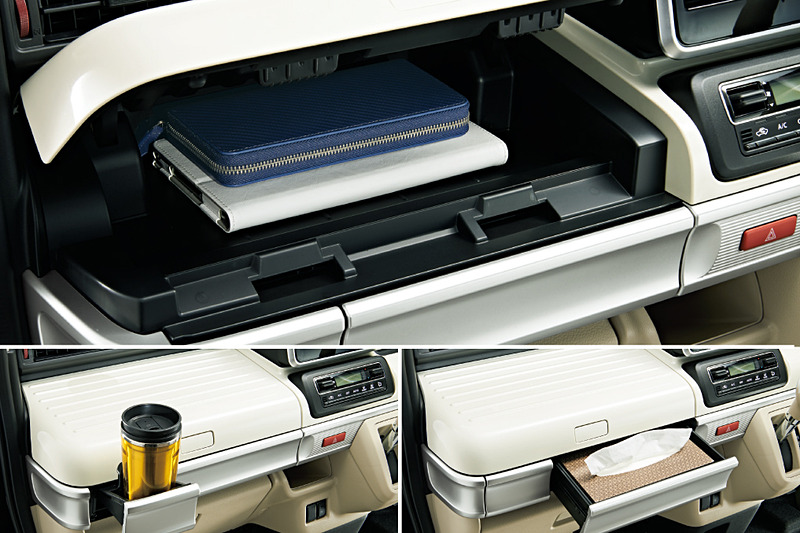 スペーシア/スペーシア カスタムは収納も充実。助手席のカラーパネルは、ボタンを押すと助手席のインパネアッパーボックスとなるほか、ティッシュボックスがすっぽり入るインパネボックスや使わないときは収納できるドリンクホルダーも設置