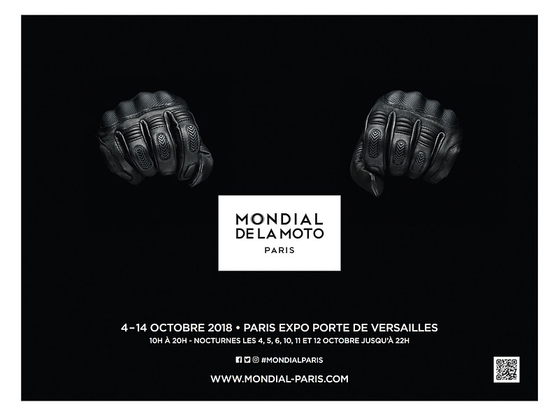 パリモーターサイクルショーのポスターは、グローブをはめて2輪車のハンドルを握っている手がモチーフ