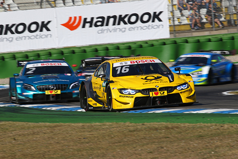 30周目にガリー・パフェットをパスするティモ・グロック（16号車）