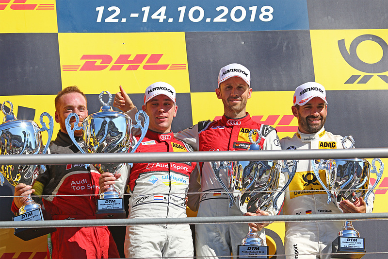 優勝のレネ・ラスト。左は2位のロビン・フリジン、右は3位のティモ・グロック