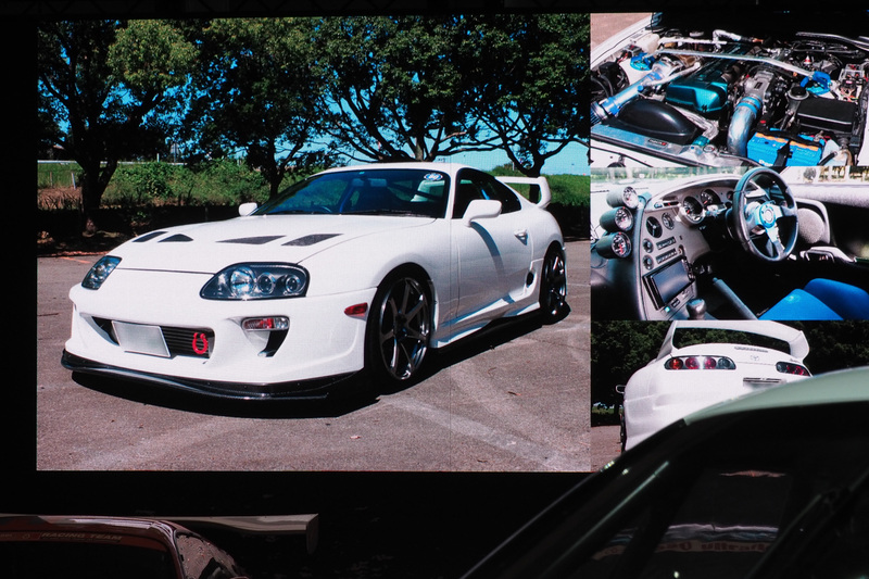 友山氏の個人所有のスープラも写真で紹介。トヨタの役員駐車場に乗り付け、警備員に阻止されたというエピソードが紹介された。その後、警備員には独特の直6サウンドでクルマを覚えてもらったという