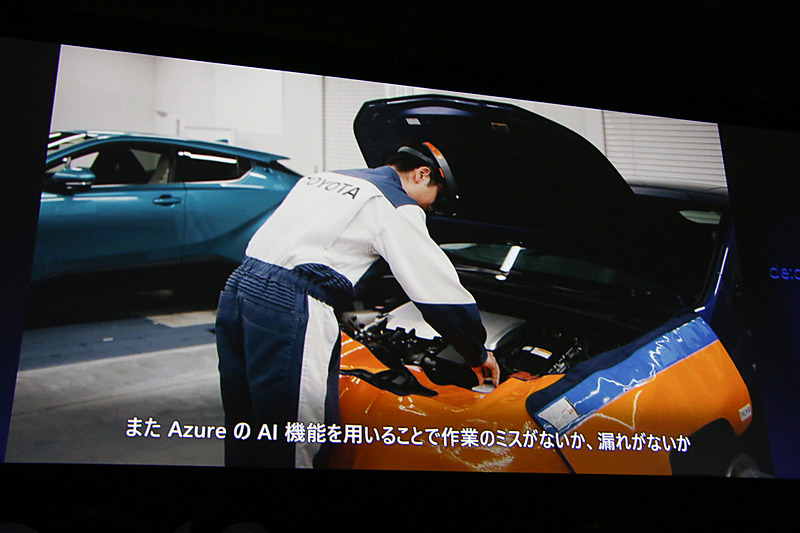 動画内ではラジエターのリザーバータンクのキャップが取り付けられていないことをAIが発見して装着者に注意喚起。作業台からキャップを取って作業ミスが未然に防がれるといったシーンも紹介されている