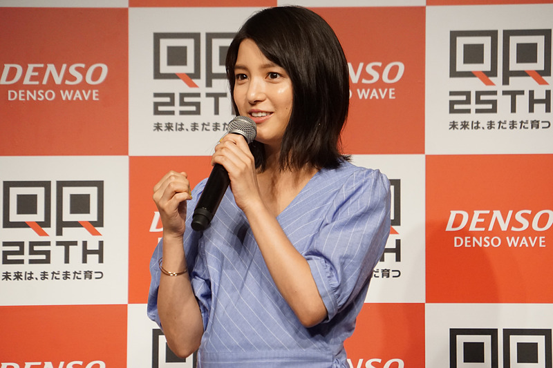 川島さんのプライベート写真とともにQRコードの進化を振り返った