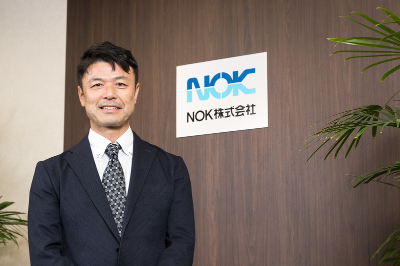 取材に対応していただいたのはNOK株式会社 営業本部 営業管理部 企画課長の村上司氏