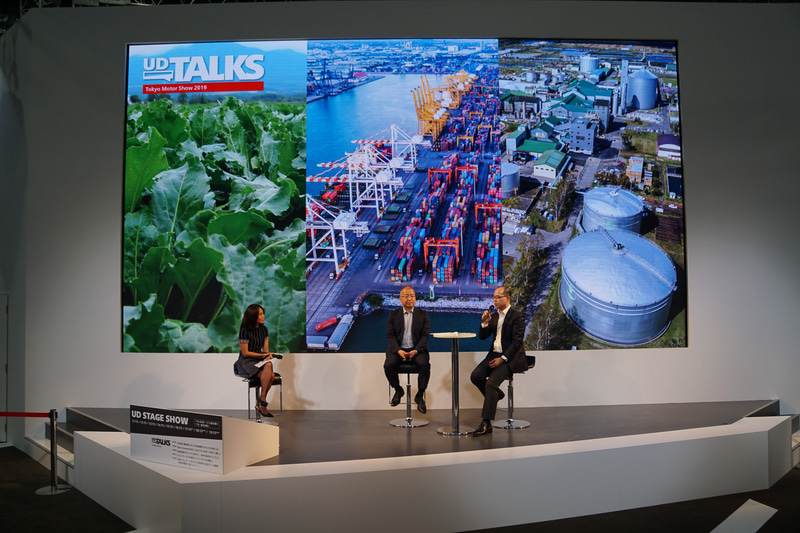 トークセッションでは、農産業や地域物流に関わる人材の高齢化や人材不足といった課題が報告されるとともに、そういった課題解決に向けて限定エリアにおいて自動運転を活用する可能性など、UDトラックスが実用化に向けて取り組んでいるレベル4自動運転が果たす役割などについて語られた