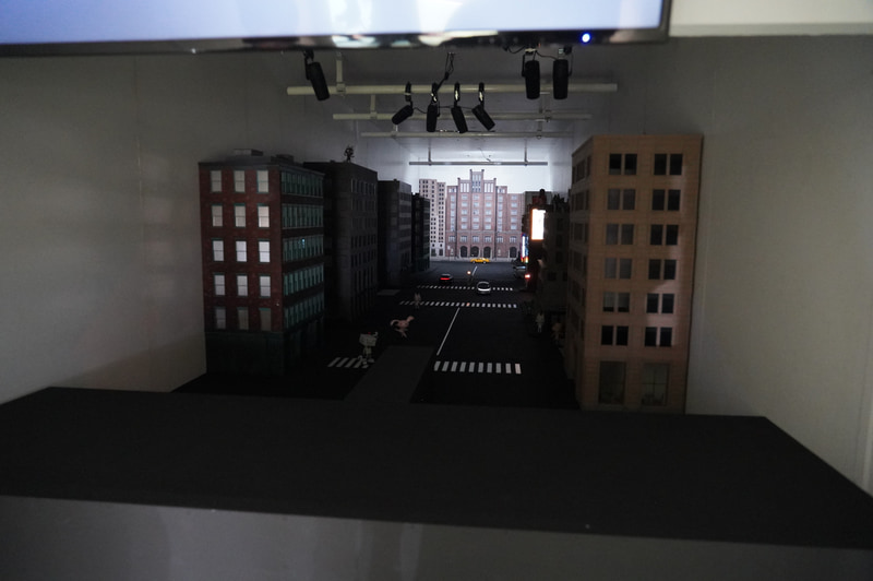 ソニーの車載向けCMOSセンサーのデモ。暗くてキャラクターが見えない