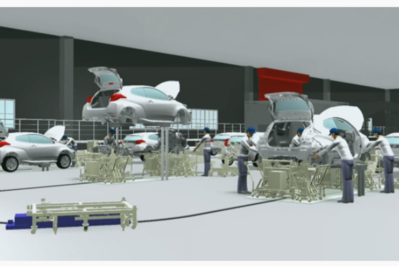 「GRファクトリー」では、左手前に見えるAGVが活用される。車体を持ち上げるエレベータもあるようだ。セル生産の特徴である屋台などもあるのだろうか？