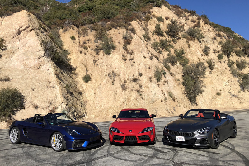 トヨタ自動車「スープラ」（中）、BMW「Z4」（右）、ポルシェ「718 スパイダー」（左）を乗り比べ