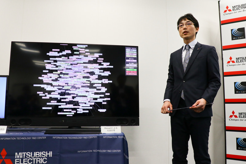 デモを解説する三菱電機株式会社 情報技術総合研究所 知識情報処理技術部 推論技術グループマネージャー 田口進也氏