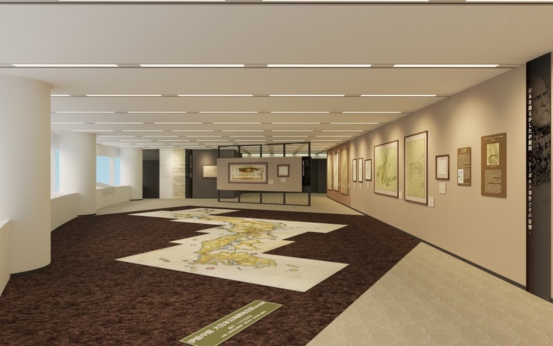 歴史のある資料がずらりと並ぶ室内。床には日本地図も