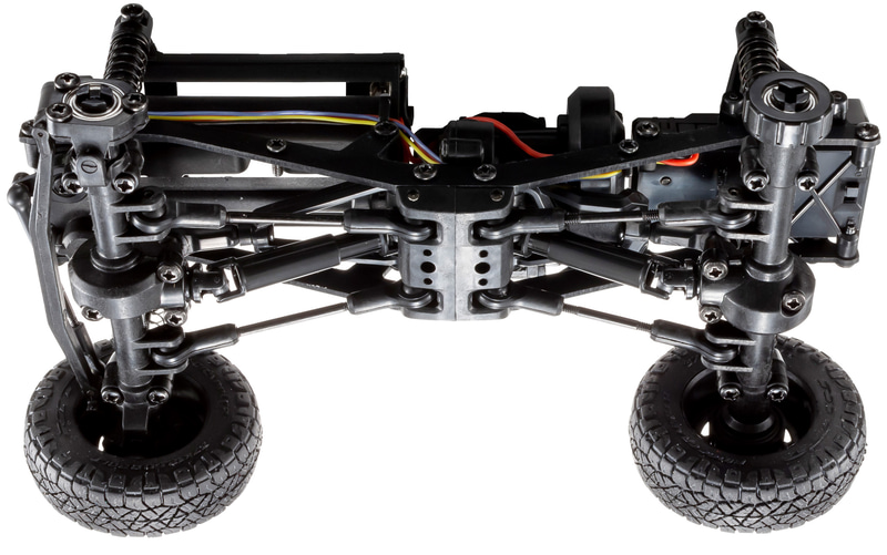 ミニッツ4×4は、実車モデルの多くに取り入れられているラダーフレーム（スチール製）を採用。これに組み合わせる各種樹脂製パーツとのバランスを図ることで、走行に適したシャシー剛性を確保