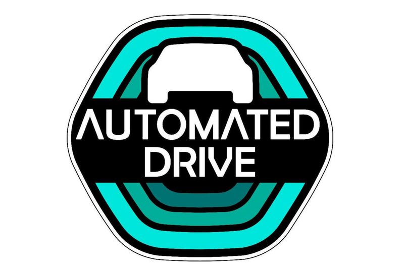 自動運転車の車体後部に貼付するステッカー