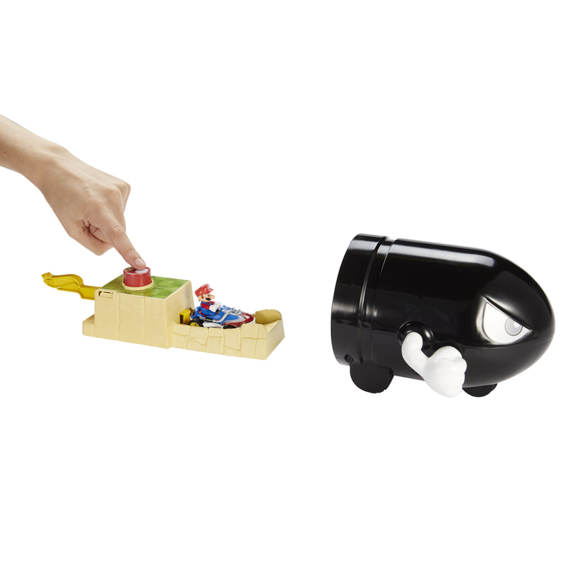 赤いボタンを押すと勢いよくミニカーが飛び出て「キラー」の中に入っていく