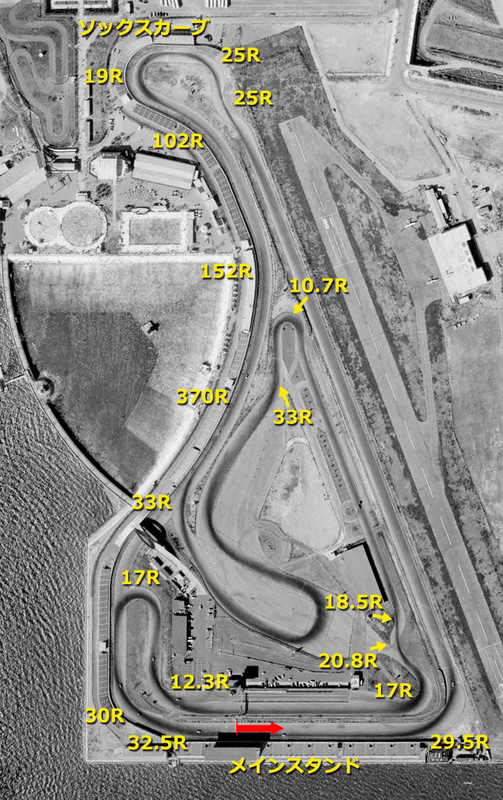 船橋サーキットのコースレイアウト。さまざまな資料から各コーナーのRを記入してみた。走行ラインが黒く残っていて3.1kmのレイアウトが見える（<a href="https://mapps.gsi.go.jp/">国土地理院の空中写真閲覧サービス</a>を加工して掲載）