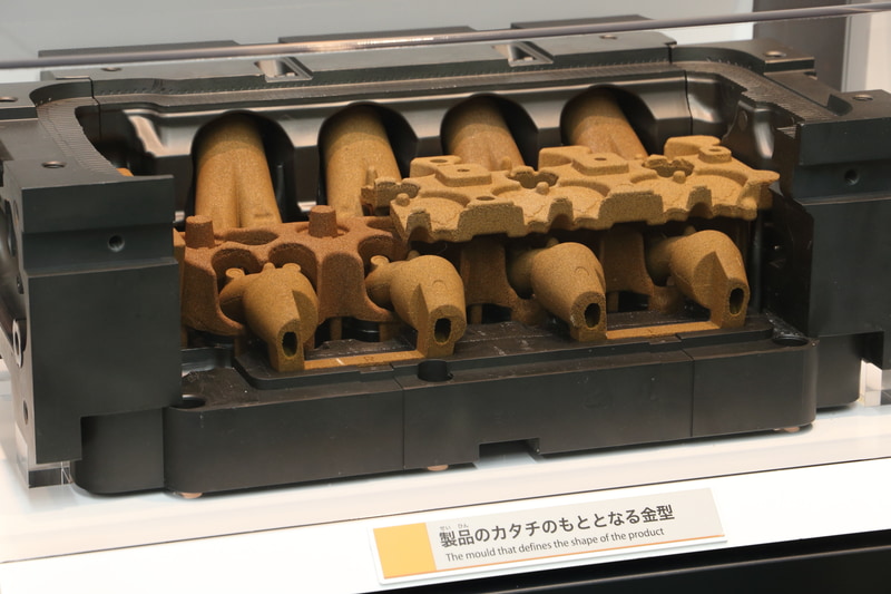 金型の作成や切削、ピニオン加工から素材による比重の違いなど、クルマをつくるさまざまな技術を分かりやすく説明するコーナー。削ったり磨いたりする機械加工や樹脂形成まで充実した内容の展示です