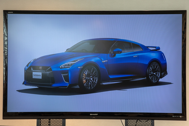 来賓の挨拶。こちらは日産自動車株式会社　GT-R/フェアレディZ統括責任者の田村宏志氏