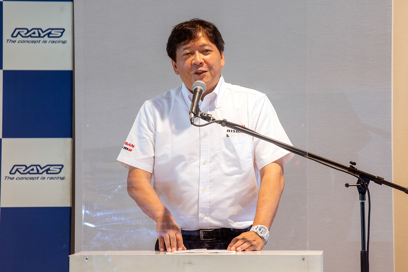 来賓の挨拶。ニッサン・モータースポーツ・インターナショナル株式会社　代表取締役 兼　最高執行責任者の松村基宏氏