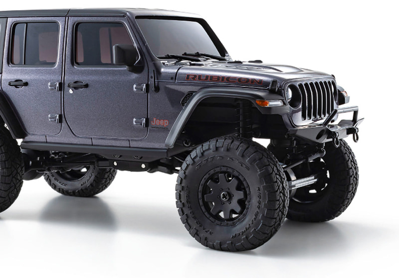 SUVタイヤで定評の『NITTO RIDGE GRAPPLER』を再現し、台形ホイールデザインとガンメタリックアルミカラーを表現。ボディやシャシーが実車ライクなミニッツ4×4のスケール感の高さをきわだたせた