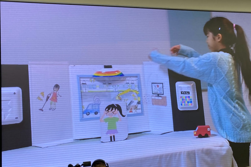 第18回を迎えた「子どもアイディアコンテスト」の最終審査会は、例年なら子どもたちが作品とともに登壇してプレゼンテーションを行なう、Hondaウエルカムプラザ青山のステージ上のスクリーンと、子どもたちの自宅をつないで、リモートで開催されました。みんな、いつもよりリラックスした雰囲気で大人顔負けのプレゼンを披露していたのが印象的。質問タイムでは子どもらしい素の表情が垣間見えて、そのギャップが可愛らしかったです