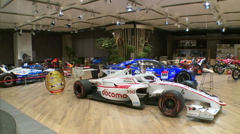 ホンダの青山ショールームを会場として行なわれた、会場にはチャンピオンマシンが所狭しと並んだ