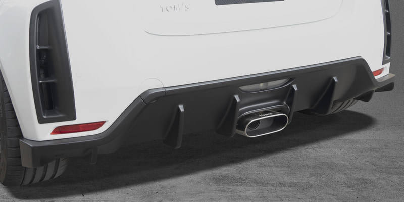 TOM'S GR YARIS Type TK リアディフューザー＆エキゾーストシステム「トムス・バレル」（“Type TK”用のトムス・バレルは7月下旬販売開始）。価格はリアディフューザーがフラットブラック：13万2000円、素地：9万1300円。トムス・バレルがGXPA16用/MXPA12用ともに25万8500円