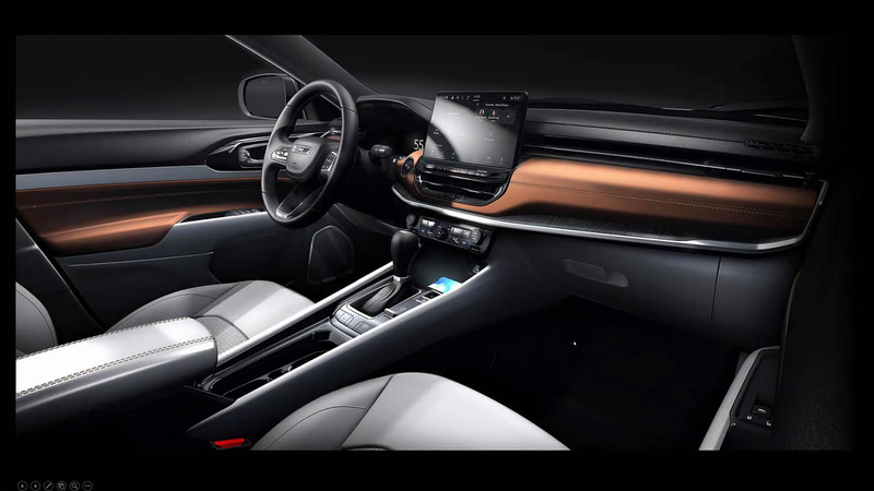 新しいコンパスのインテリアデザイン。水平のラインを強調するとともに、インパネ中央の“ボルスター”が幅広さを印象づけている