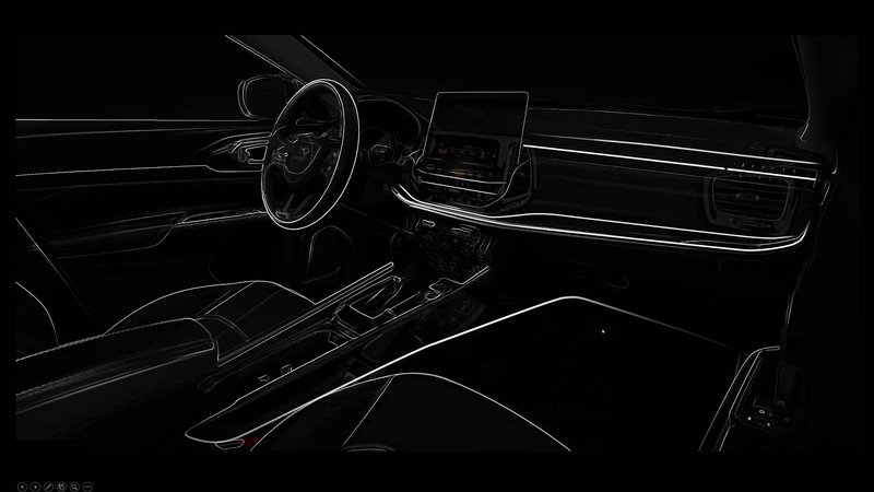 新しいコンパスのインテリアデザイン。水平のラインを強調するとともに、インパネ中央の“ボルスター”が幅広さを印象づけている