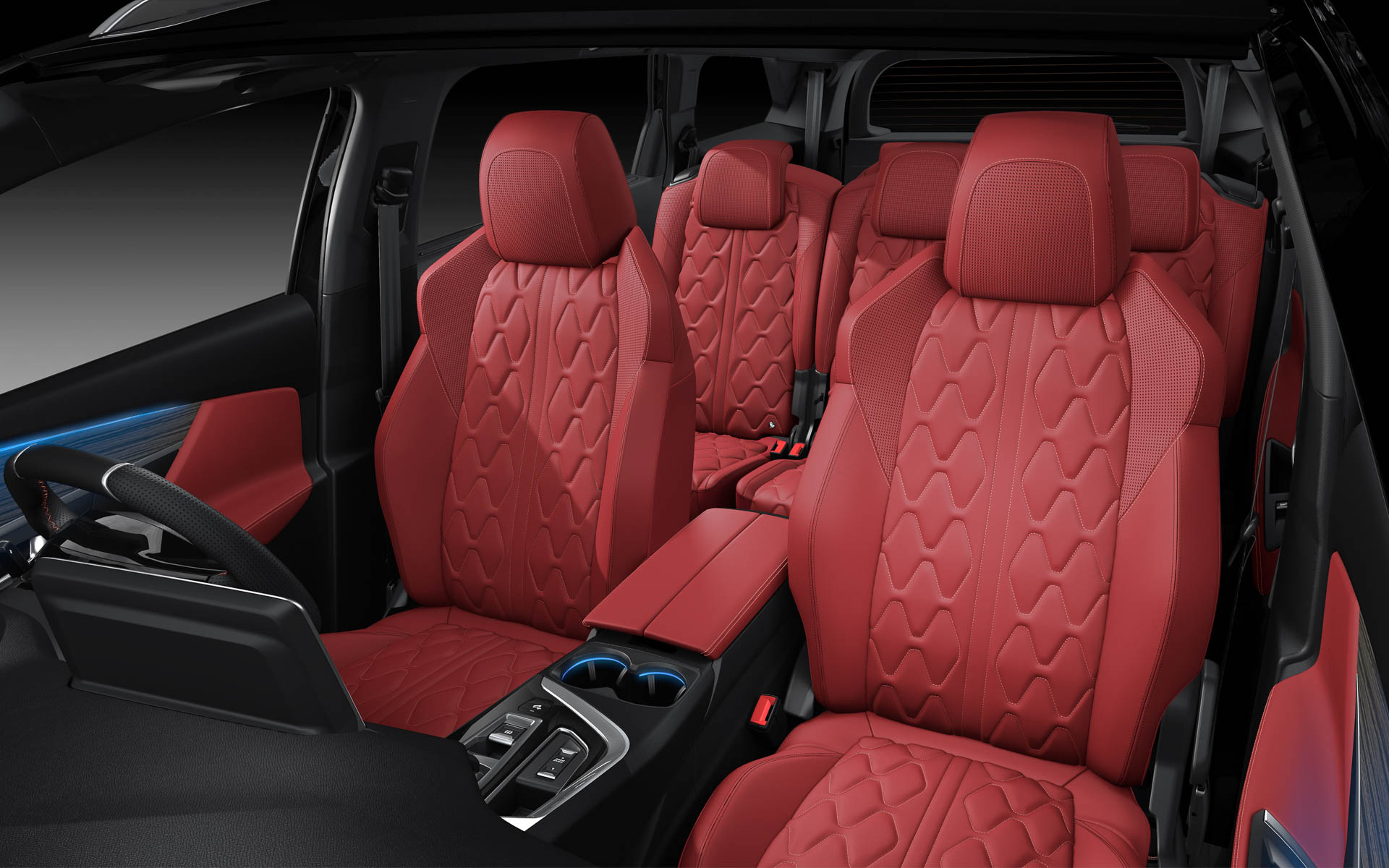 特徴的なレッドナッパレザーシートのほか、オープンポア仕上げのモダンな印象のウッドパネルのデコレーションをインストルメントパネルに採用