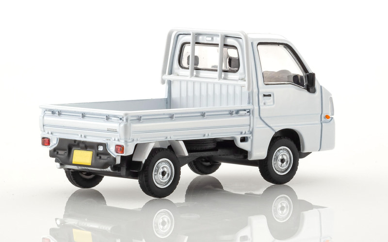 京商、スバル「サンバー」のミニカーと小冊子をセットにした