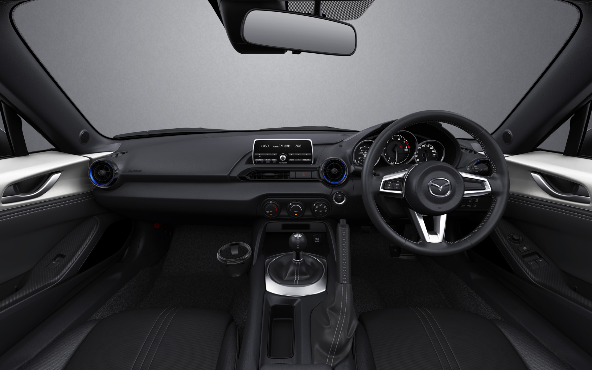 ブルーとピアノブラックのエアコンルーバーベゼル