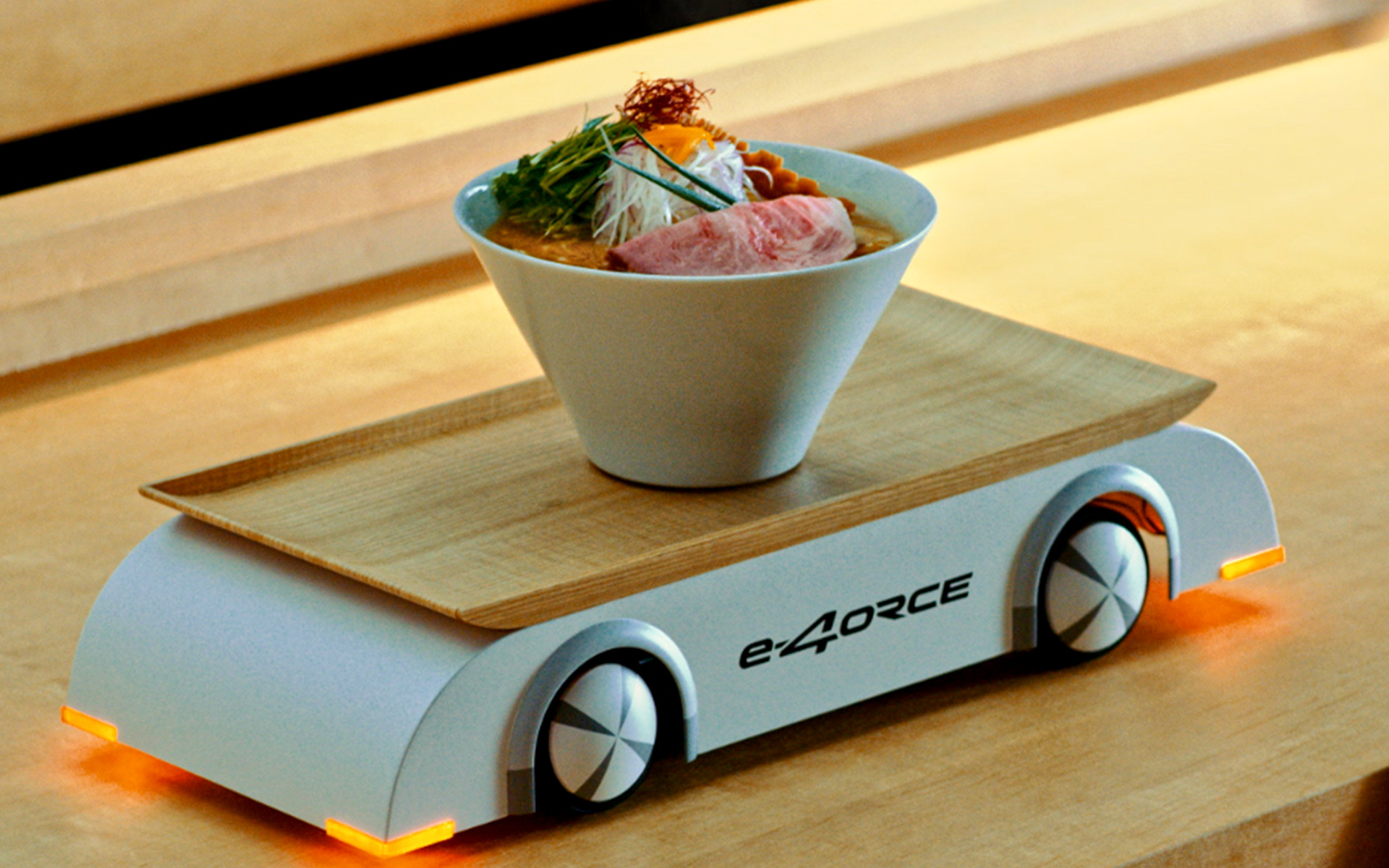 日産のスープをこぼさずラーメンを運ぶ「e-4ORCEラーメンカウンター」