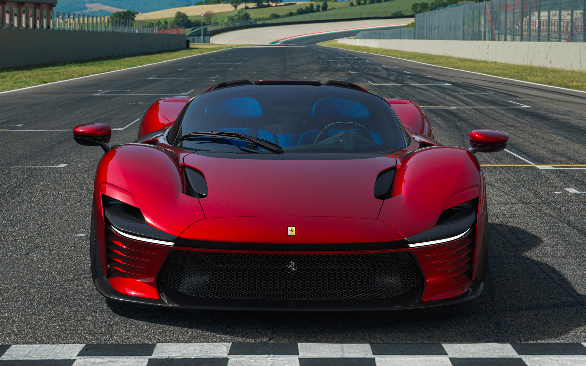 写真はフェラーリ「デイトナSP3」のフロントを撮影したもの。ティザー写真で公開された新型モデルはデザインテイストは似ているものの、そのシルエットはこれまでのフェラーリモデルとは異なっている