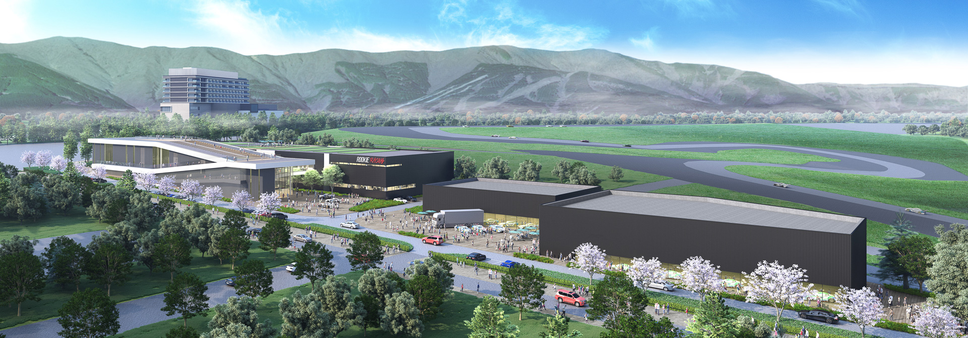 富士西ゲート近くのレーシングガレージ。すでに竣工したルーキーレーシング1期棟近くに、巨大な展示スペースが設けられているのが分かる。なんだこれは？