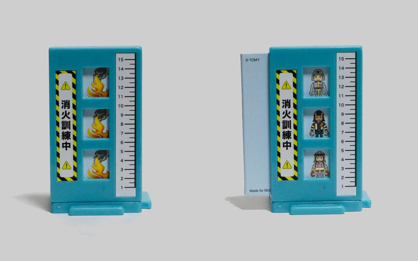 消火訓練施設は裏側に差し込んだカードをスライドさせると窓から見える絵を変えられるようになっている