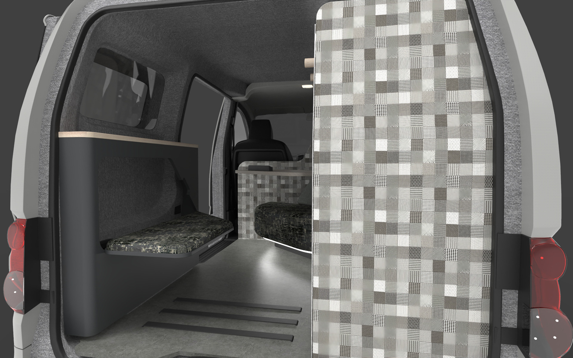 タイヤハウスを活かしたサイドテーブルには、後傾姿勢で足を乗せることができる格納式のオットマンが収納されている