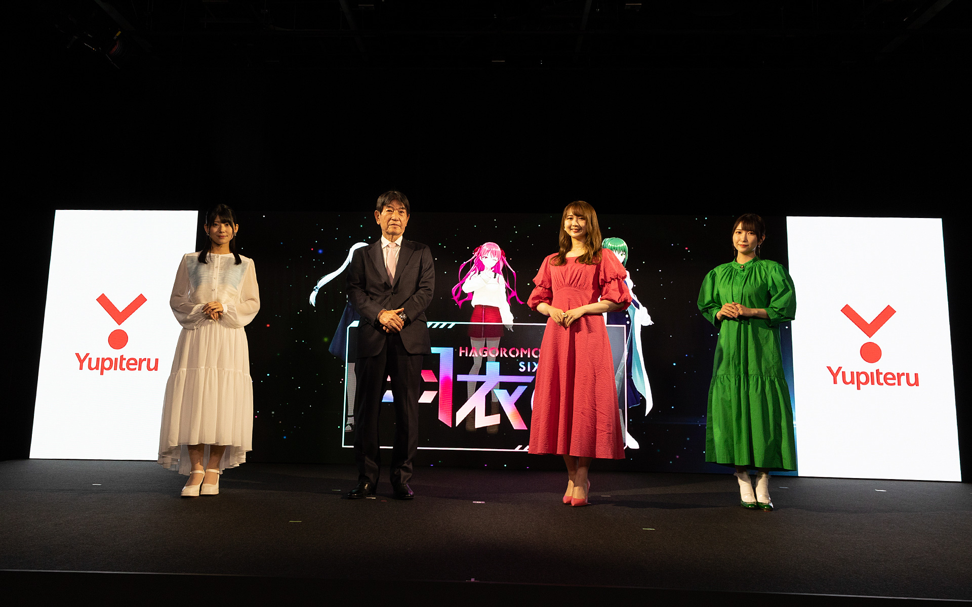 ユピテル研究所2号棟発表会に出演した女性声優と株式会社ユピテル 代表取締役会長兼CEOの安楽憲彦氏