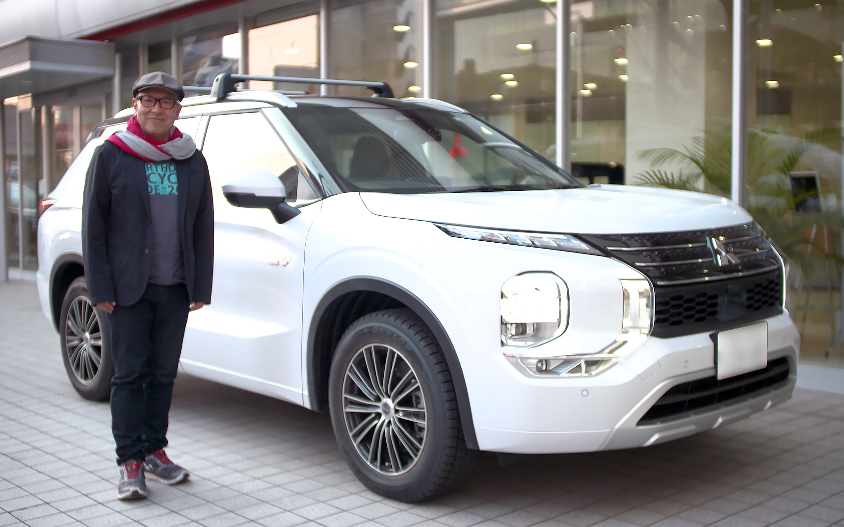 環境に優しいクルマを乗り継いできた久米さん。クルマ選びへのこだわりは強い。環境に優しいだけでなく実用的であることもクルマに求めている