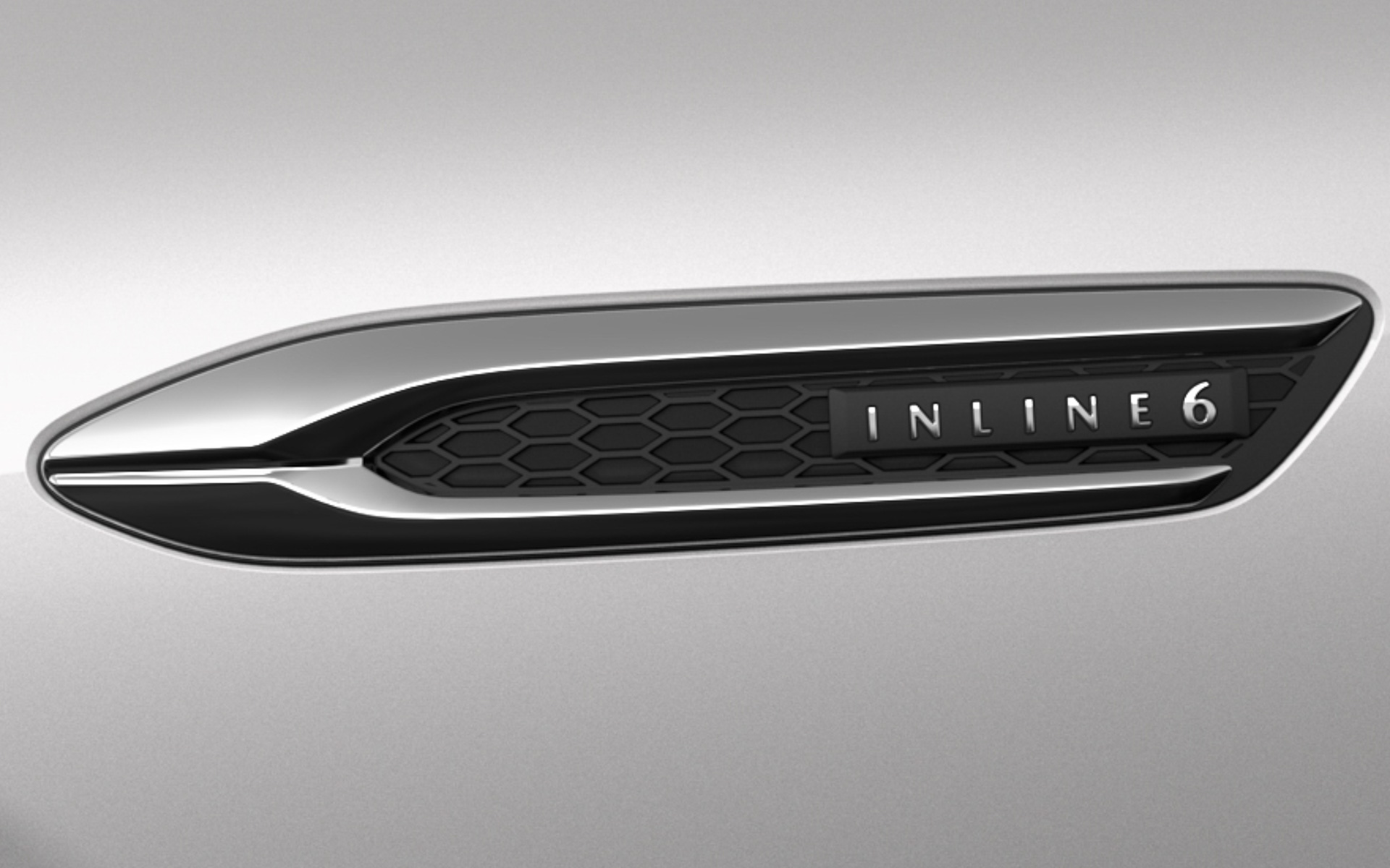 直列6気筒ディーゼルエンジン搭載モデルには、その証となるエンブレムがフロントフェンダーに配されている