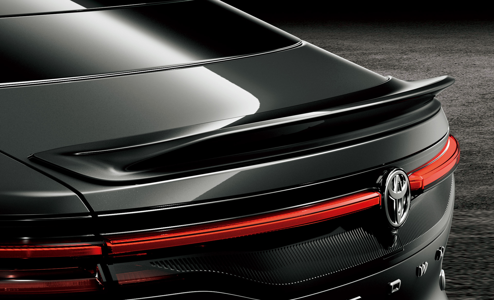 GRリヤトランクスポイラー：トランク上面の風を斜め上方に変化させる事でダウンフォースを生み出し、高速走行時の安定感を向上。カラーはブラックとし、よりアグレッシブなスポーツスタイルを演出