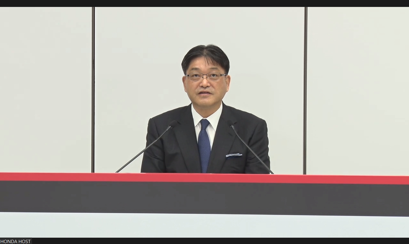 質疑応答で回答する竹内氏